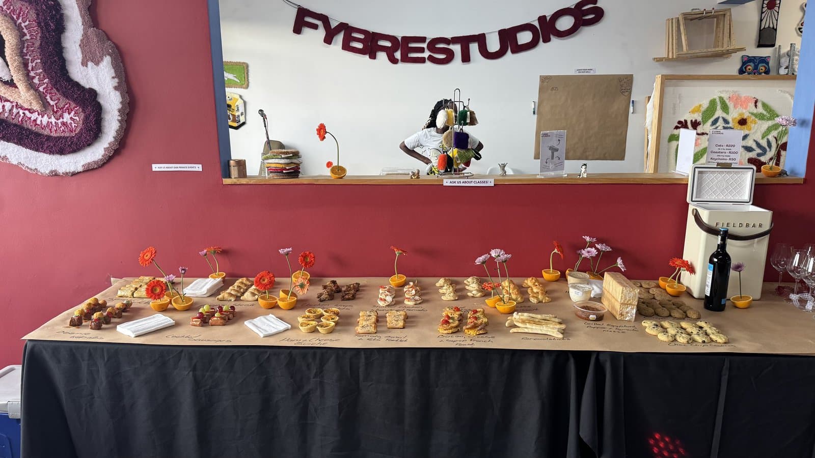 Fybre Studios market stall table with tufted rugs and patches on display