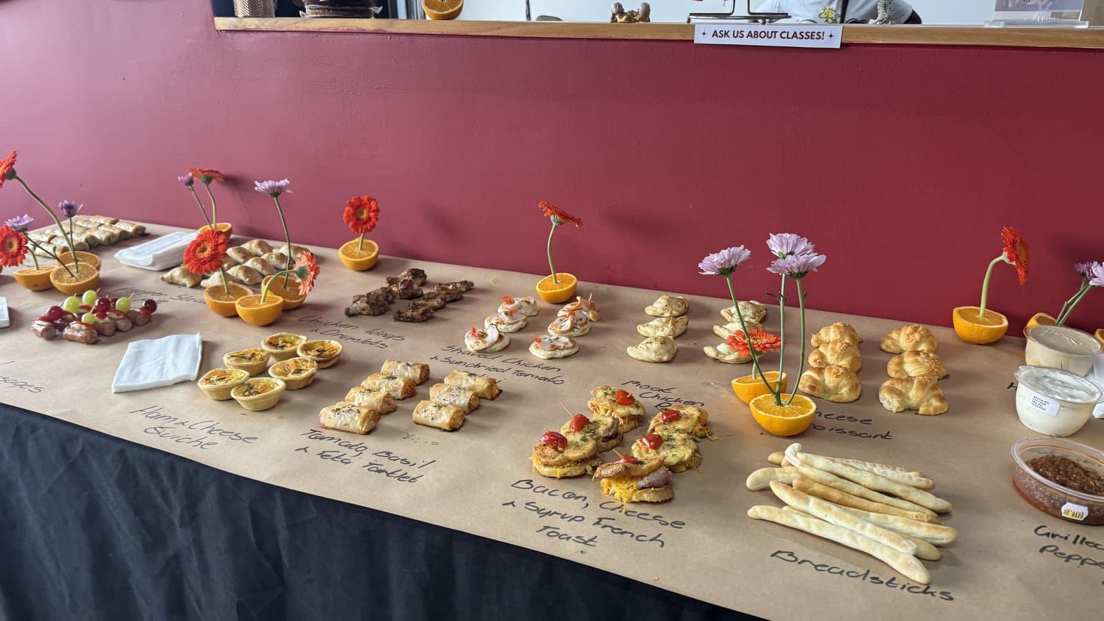 Table spread of snacks and treats at a studio event